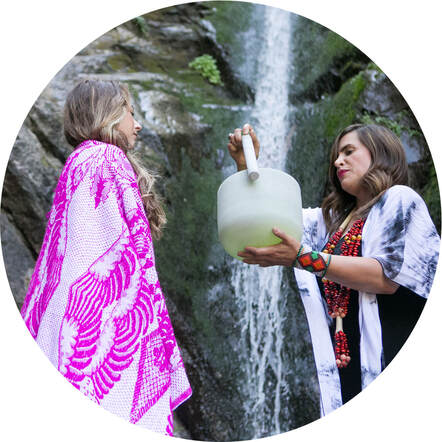 Two Woman using crystal sound bowl with Peace Love Kambo working in Kambo Utah Waterfalls at a Utah Kambo Training 